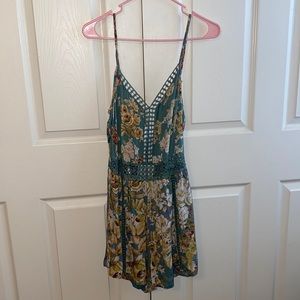 Women’s size small romper. Open back.